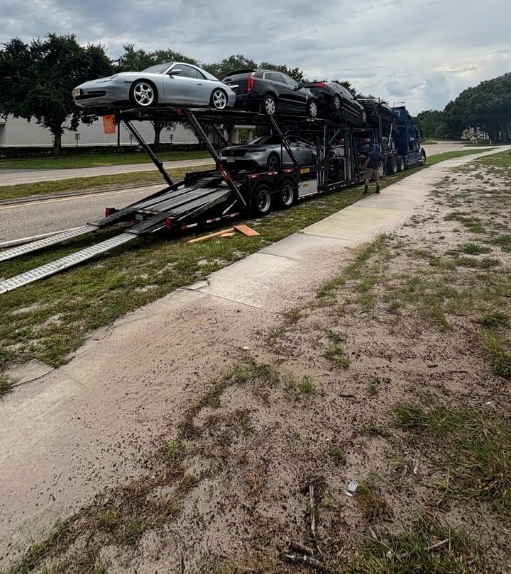 Car carrier loaded with cars ready for door-to-door delivery